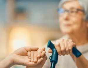 elder holding her stand