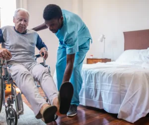 nurse helping elder patient