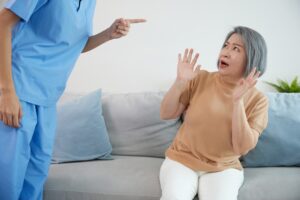 A frightened woman in a nursing home wonders who can file a nursing home abuse lawsuit in Georgia.
