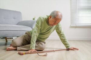 A man on the floor after a fall wonders if he can sue a nursing home for a fall that resulted in a serious injury.