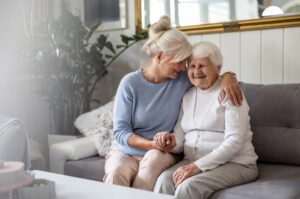 A woman visits with her mother in a nursing home, but wonders what she should do if her loved one is injured in a nursing home fall.