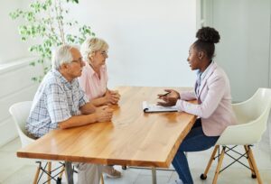 A lawyer meets her clients and tells them what happens during a nursing home abuse lawsuit. 